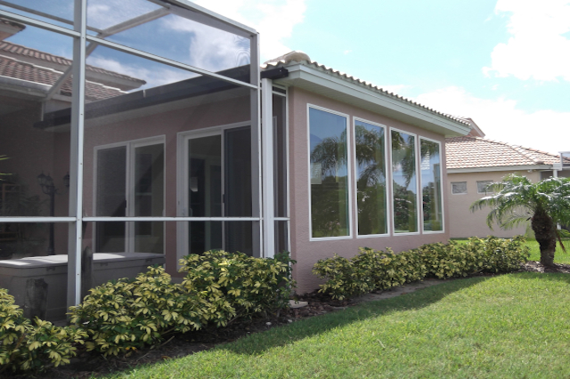 Outside Sunroom Home Additon Windows Screen Room Impact rated windows and sliding glass doors with screen room attached