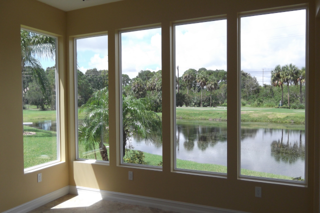 Interior Sunroom Pond Picture Window View of pond through 5 picture windows side by side of home addition